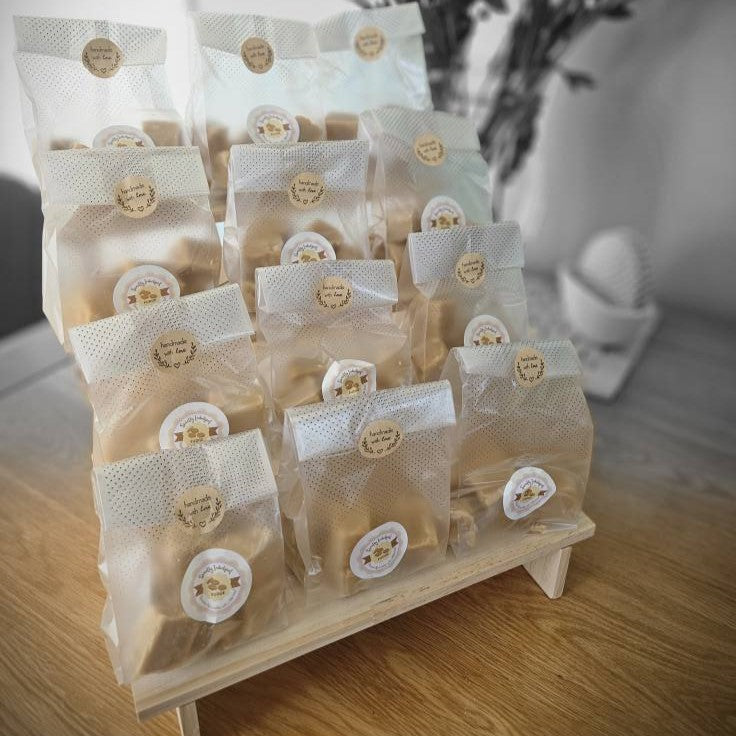 Fudge bags with chucks on wooden display rack