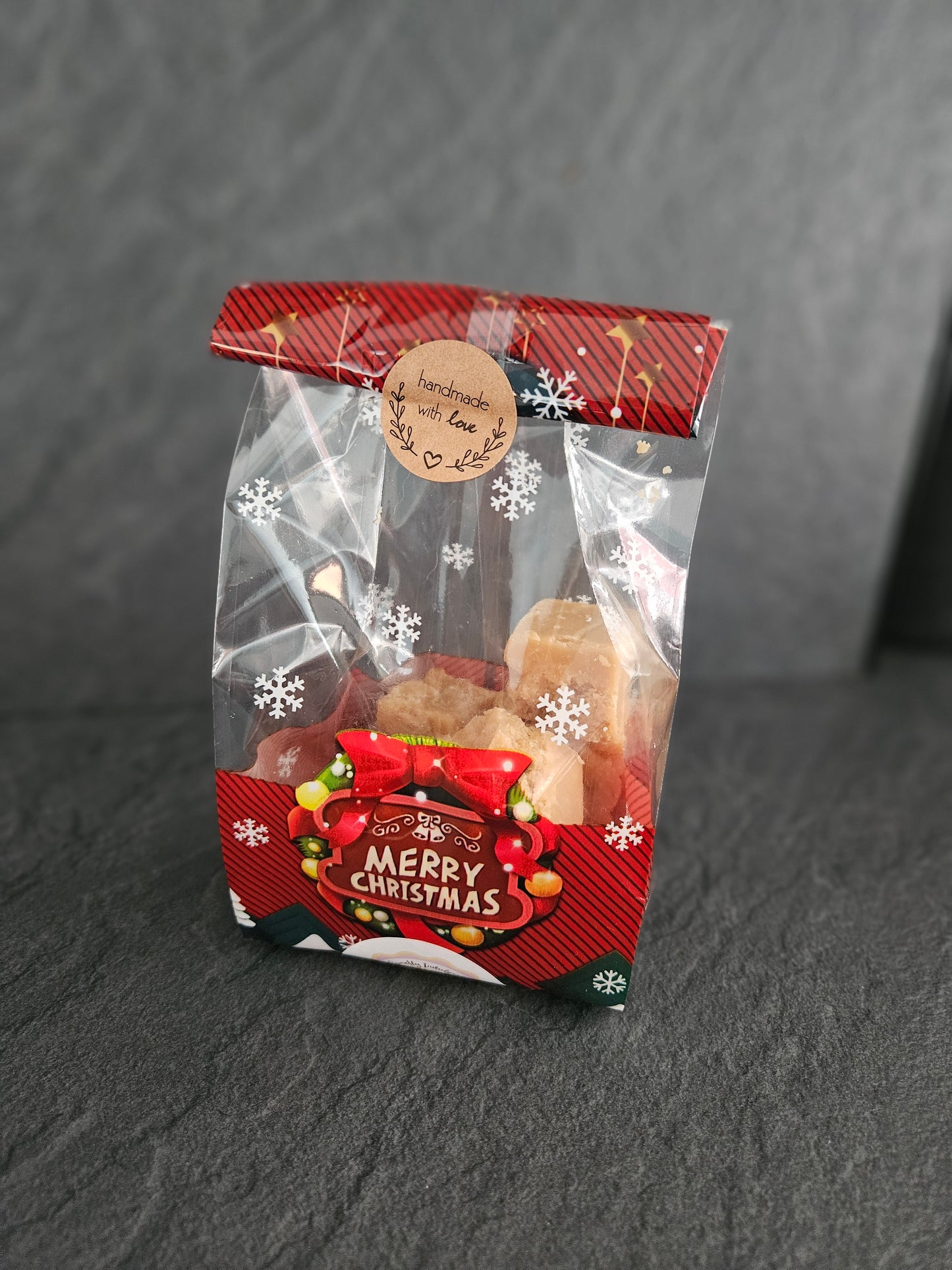 8 pieces of fudge in a Christmas themed bag