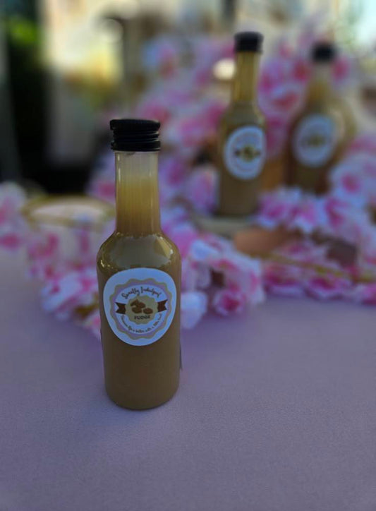Fudge sauce bottle with company logo