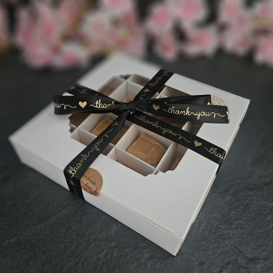 Large fudge gift box with 16 pieces of fudge and a black ribbon